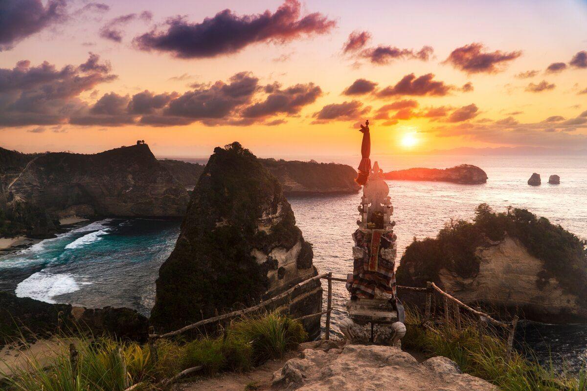 Atuh Beach Nusa Penida sunrise view with rock formations and calm sea